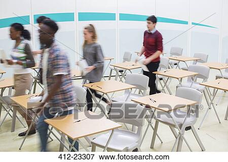 Students going out of classroom after lesson View Large Photo Image Stock Photo - Students going out of classroom after lesson. Fotosearch