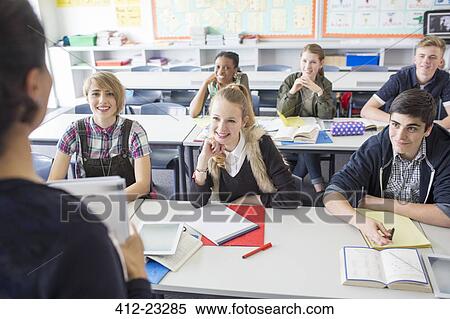 Students in classroom during lesson View Large Photo Image Stock Photography - Students in classroom during lesson. Fotosearch
