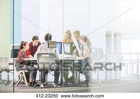 Students working with computers behind glass door View Large Photo Image Stock Image - Students working with computers behind glass door. Fotosearch