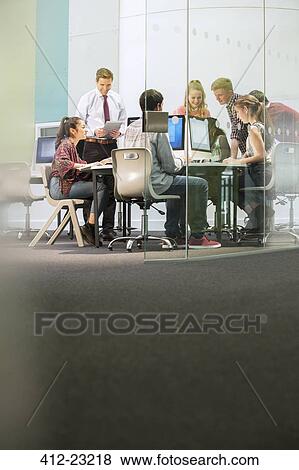 Students working with computers during IT lesson View Large Photo Image Stock Photo - Students working with computers during IT lesson. Fotosearch