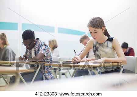 Students writing their GCSE exam in classroom View Large Photo Image Stock Image - Students writing their GCSE exam in classroom. Fotosearch