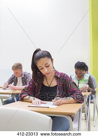 Students writing their GCSE exam in classroom View Large Photo Image Stock Image - Students writing their GCSE exam in classroom. Fotosearch