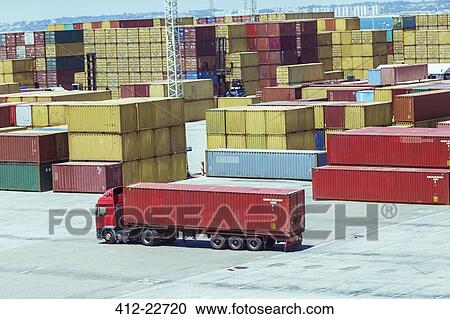 Stock Image - Truck carrying cargo container. Fotosearch