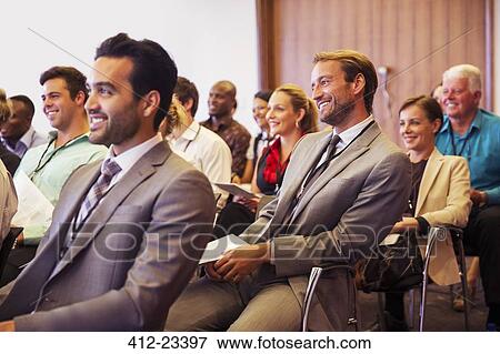 Business people attending meeting in conference room View Large Photo Image Stock Photo - Business people attending meeting in conference room. Fotosearch