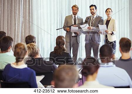 Business people giving presentation in conference room View Large Photo Image Stock Image - Business people giving presentation in conference room. Fotosearch