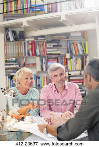 Business people talking in meeting View Large Photo Image Stock Photo - Business people talking in meeting. Fotosearch