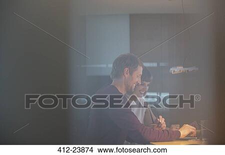 Picture - Business people talking in office meeting. Fotosearch