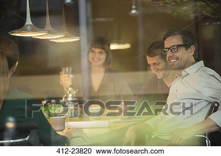 Business people talking in office meeting View Large Photo Image Stock Image - Business people talking in office meeting. Fotosearch