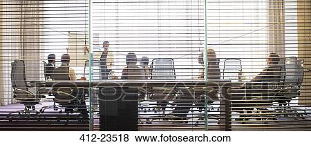 Business people watching presentation in conference room View Large Photo Image Stock Photo - Business people watching presentation in conference room. Fotosearch
