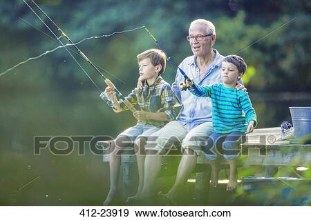 Grandfather and grandsons fishing in lake View Large Photo Image Stock Photo - Grandfather and grandsons fishing in lake. Fotosearch