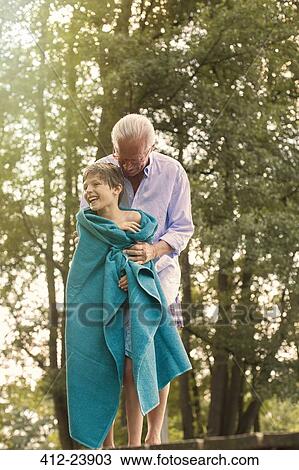 Grandfather drying grandson with towel View Large Photo Image Stock Image - Grandfather drying grandson with towel. Fotosearch