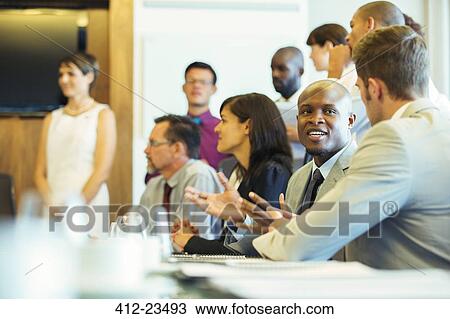 Group of business people having meeting in conference room View Large Photo Image Stock Image - Group of business people having meeting in conference room. Fotosearch