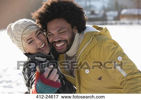 Happy couple taking selfie in snow View Large Photo Image Stock Photo - Happy couple taking selfie in snow. Fotosearch