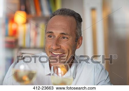 Older man drinking white wine View Large Photo Image Stock Image - Older man drinking white wine. Fotosearch