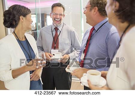 People in lobby of conference center during coffee break View Large Photo Image Stock Photo - People in lobby of conference center during coffee break. Fotosearch