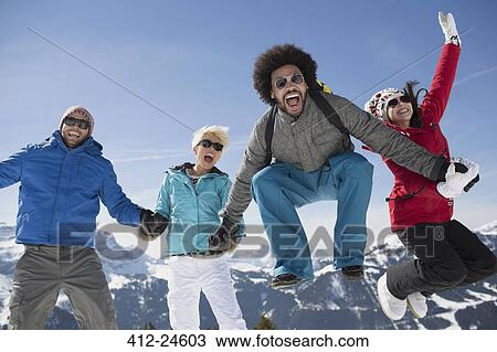 Portrait of exuberant friends in snow View Large Photo Image Stock Image - Portrait of exuberant friends in snow. Fotosearch