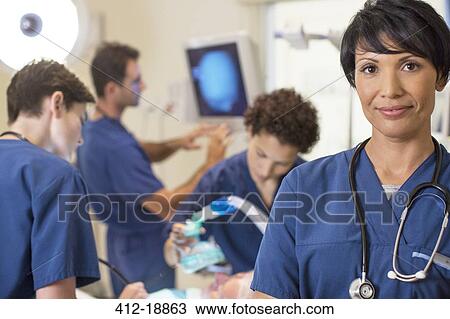 Portrait of female doctor in intensive care unit View Large Photo Image Stock Image - Portrait of female doctor in intensive care unit. Fotosearch