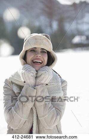 Smiling woman in snow View Large Photo Image Stock Image - Smiling woman in snow. Fotosearch