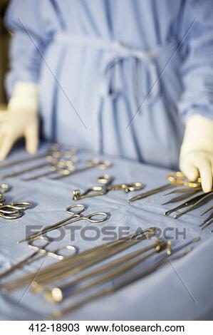 Surgical equipment on table in operating theater View Large Photo Image Stock Image - Surgical equipment on table in operating theater. Fotosearch