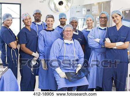 Team of doctors and nurses in operating theater View Large Photo Image Stock Photography - Team of doctors and nurses in operating theater. Fotosearch