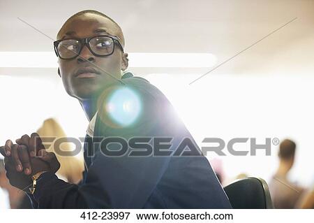 University student sitting in classroom View Large Photo Image Stock Photo - University student sitting in classroom. Fotosearch