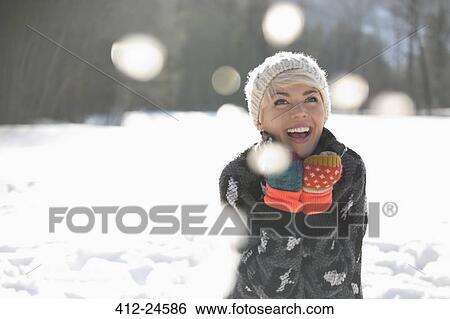 woman laughing in snow View Large Photo Image Stock Photograph - woman laughing in snow. Fotosearch