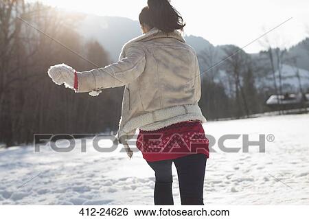 Woman running in snow View Large Photo Image Stock Photograph - Woman running in snow. Fotosearch