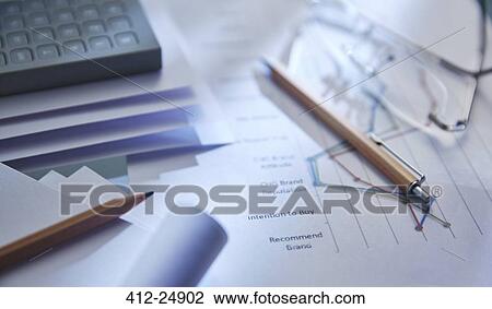 "Close up of desk with calculator, pencils and paper" View Large Photo Image Stock Image - "Close up of desk with calculator, pencils and paper". Fotosearch
