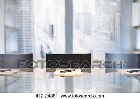"Part of modern conference room with table chairs, notepads and pens" View Large Photo Image Stock Image - "Part of modern conference room with table chairs, notepads and pens". Fotosearch