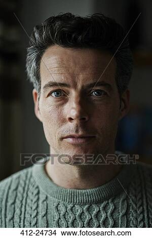 Portrait of man in green sweater View Large Photo Image Picture - Portrait of man in green sweater. Fotosearch