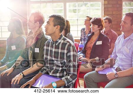 Attentive audience listening in community center View Large Photo Image Picture - Attentive audience listening in community center. Fotosearch
