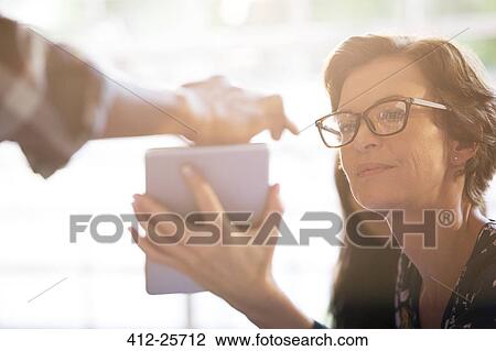 Businesswoman with digital tablet View Large Photo Image Stock Image - Businesswoman with digital tablet. Fotosearch