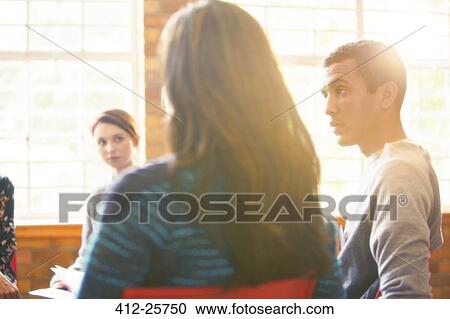 Man listening in group therapy session View Large Photo Image Stock Image - Man listening in group therapy session. Fotosearch