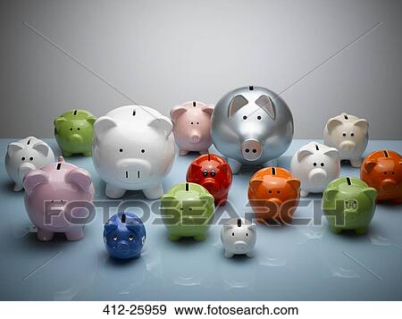 Stock Photo - Multicolor piggy banks still life. Fotosearch