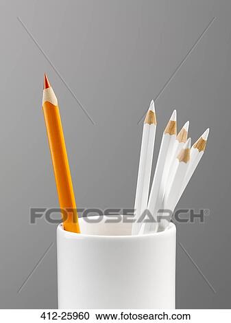 Orange pencil separated in cup with white pencils still life View Large Photo Image Stock Image - Orange pencil separated in cup with white pencils still life. Fotosearch