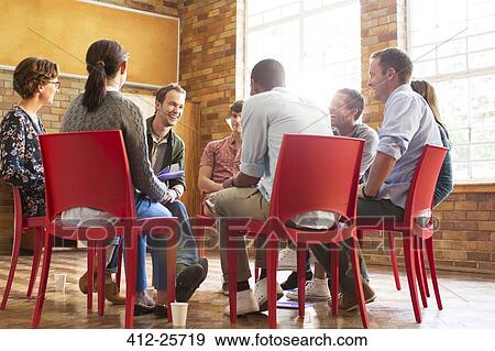 People talking in group therapy session View Large Photo Image Stock Photo - People talking in group therapy session. Fotosearch