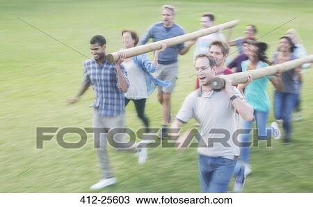 Teams racing with logs in field View Large Photo Image Stock Image - Teams racing with logs in field. Fotosearch