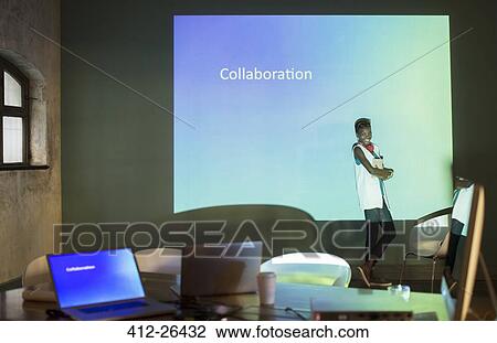 Business people preparing audio visual presentation on collaboration in conference room View Large Photo Image Stock Image - Business people preparing audio visual presentation on collaboration in conference room. Fotosearch