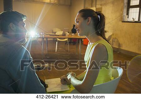 Business people preparing presentation in conference room View Large Photo Image Stock Image - Business people preparing presentation in conference room. Fotosearch