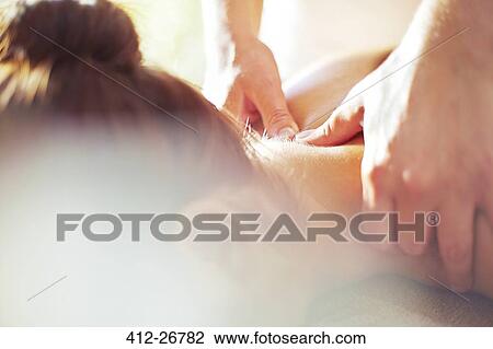 Close up masseuse massaging woman’s neck View Large Photo Image Stock Image - Close up masseuse massaging woman’s neck. Fotosearch
