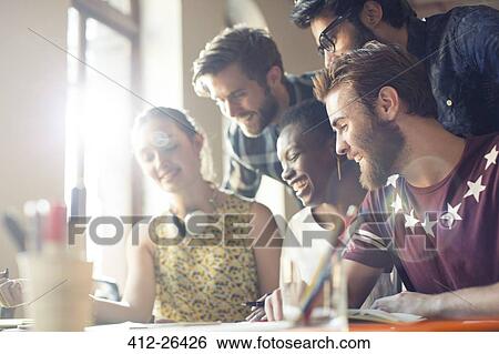 Creative business people brainstorming in office meeting View Large Photo Image Stock Photograph - Creative business people brainstorming in office meeting. Fotosearch