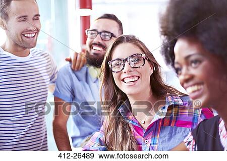 Stock Photo - Friends smiling and laughing. Fotosearch