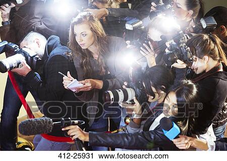 High angle view of paparazzi photographers and reporters at event View Large Photo Image Stock Image - High angle view of paparazzi photographers and reporters at event. Fotosearch