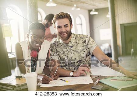 Portrait creative business people drawing diagram in office View Large Photo Image Stock Image - Portrait creative business people drawing diagram in office. Fotosearch