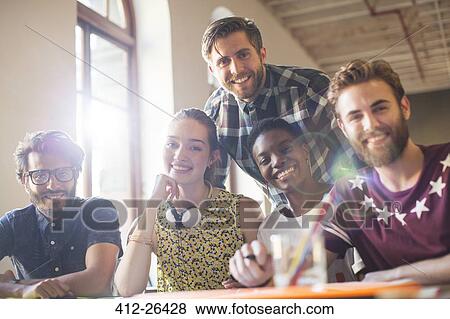 Portrait smiling creative business people in meeting View Large Photo Image Stock Photo - Portrait smiling creative business people in meeting. Fotosearch