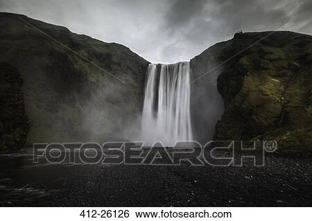 "Waterfall over cliffs, Skogarfoss, Iceland" View Large Photo Image Stock Photograph - "Waterfall over cliffs, Skogarfoss, Iceland". Fotosearch