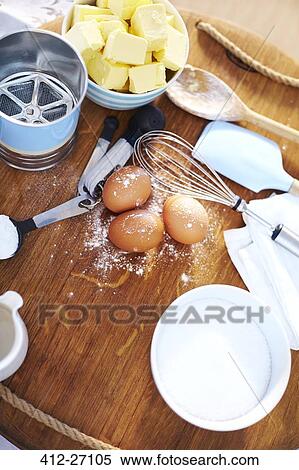 Baking ingredients on cutting board View Large Photo Image Stock Photography - Baking ingredients on cutting board. Fotosearch