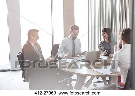 Business people meeting in conference room View Large Photo Image Stock Photo - Business people meeting in conference room. Fotosearch