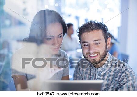 Business people using digital tablet View Large Photo Image Stock Photo - Business people using digital tablet. Fotosearch