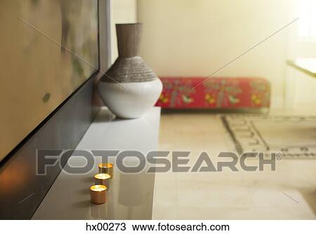 Stock Image - Candles on foyer table. Fotosearch